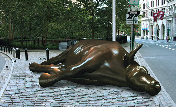 Fallen bull statue in Wall Street